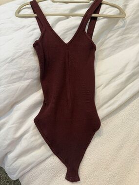 Dress Forum Ribbed V-Neck One-Piece Bodysuit in Deep Wine